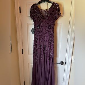 Brand new in bag Adrianna Papell plum gown.  Size 10 not altered in any way!